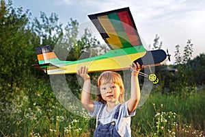 Children with airplan toy