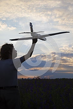 Children with airplan toy