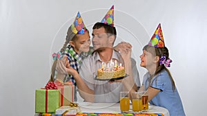 Children arranged a surprise for dad and presented a cake