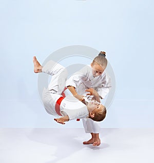Children athletes train judo throws photo