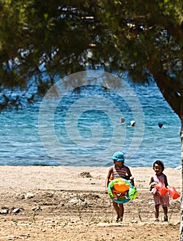 Children at the beach in the Peloponese in greece