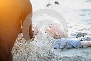 Children on the beach playing in the sand