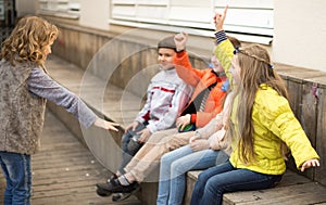 Children on bench playing children`s games