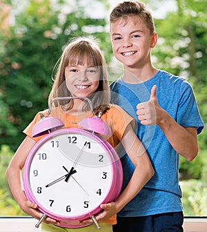 Children with big clock