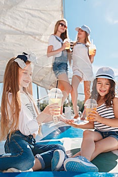 The children on board of sea yacht