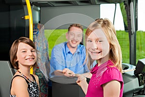 Children boarding a bus