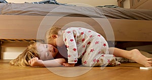Children bonding on floor