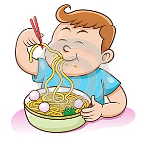 Children boy eating noodles with chopsticks