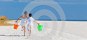 Children, Boy Girl Brother Sister Running Playing on Beach photo