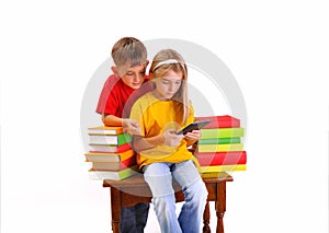 Children - a boy and girl reading e-book