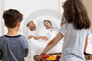 Children carrying breakfast