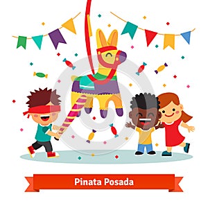Children celebrating Posada by breaking Pinata photo