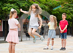 Children with chinese jumping rope