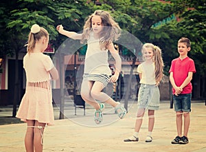 Children with chinese jumping rope