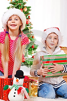 Children with Christmas presents