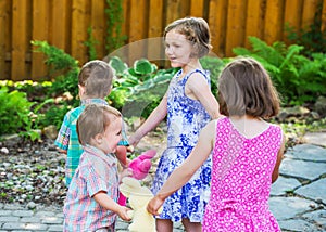 Children in a Circle Playing Ring Around the Rosie