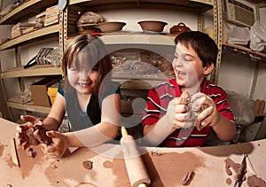 Children in a clay studio