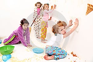 Children Clean Up After Food Fight Pajama Party