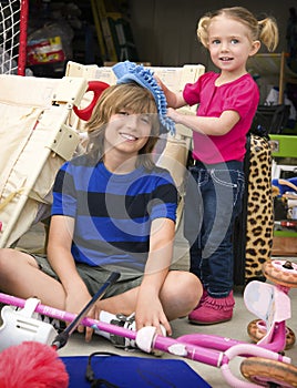 Children Cleaning the Garage