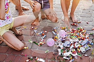 children collect sweets and surprises from piÃ±ata at a children party