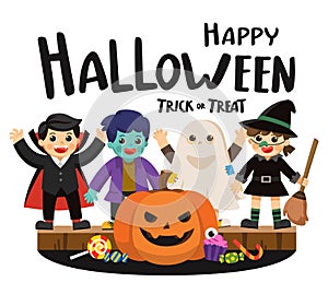 Children in colorful costumes and pumpkins with candy.