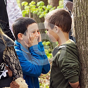 Children communicating and playing in nature