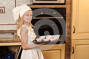 Children cooking Christmas cakes