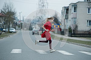 Children crossing street on crosswalk