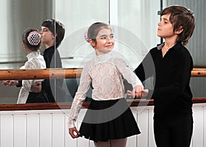 Children dancing in a ballet barre