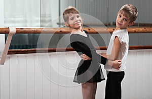 Children dancing in a ballet barre