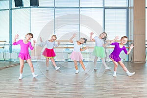 Children dancing in choreography class. happy children dancing on in hall, healthy life, kid`s togethern dance kid class