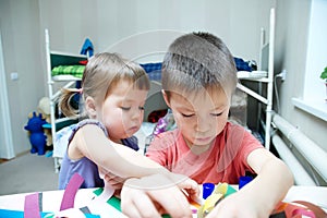 Children development - brother and sister playing together