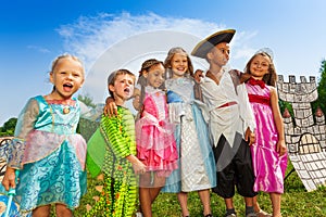 Children diversity in festival costumes standing