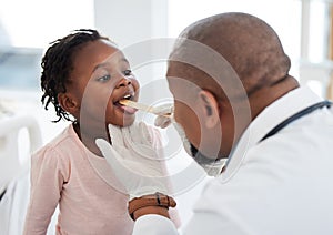 Children doctor, tongue and throat exam in healthcare hospital, wellness room and medical consulting clinic. Medicine