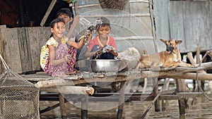 Children with dog, Tonle Sap, Cambodia