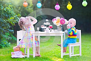 Children at doll tea party