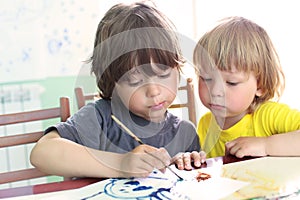 Children draw in home