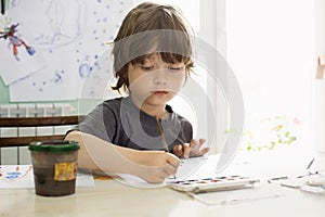 Children draw in home