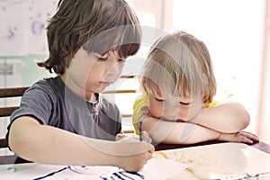 Children draw in home