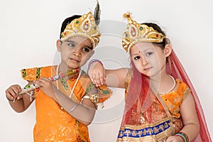 Children dress as Krishna and Radha during the Janmashtami festival