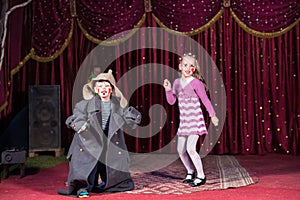 Children Dressed as Clowns Performing on Stage