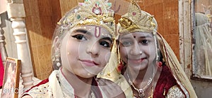 Children dressed as hindu Gods radha krishna photo