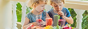 Children drink colorful healthy smoothies.. Watermelon, papaya, mango, spinach and dragon fruit. Smoothies, juices, beverages, dri