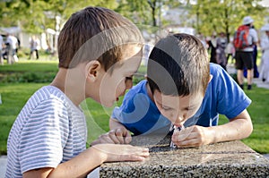 Children drinking water from fountain