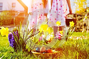 Children on Easter egg hunt with eggs