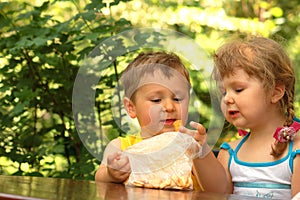 Children eating cookies