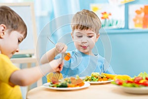 Children eating in img