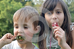 Children eating lollipops