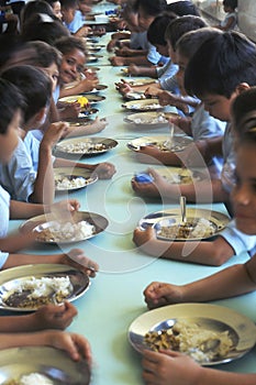 Children eating in refectory, Brazil.