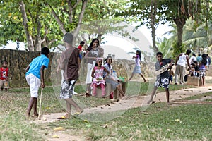 Children enjoy a game of cricket near Akersloot Bastion at Galle Fort in Sri Lanka.